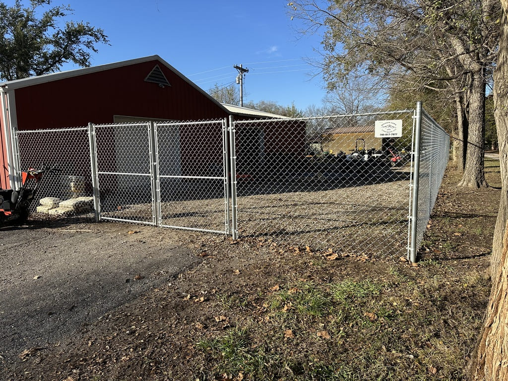 chain link fence with a open gate
